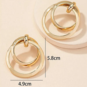 Gold twisted large hoop earrings for women